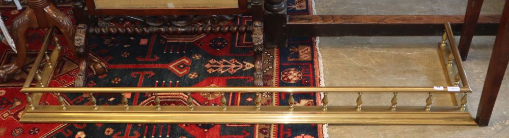 A late Victorian brass fire kerb, 170 x 40cm